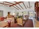 Warm and inviting clubhouse with comfortable seating, fireplace, and natural light at 7931 Mineral Peak St, Las Vegas, NV 89166