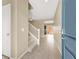 Inviting entryway featuring tiled floors, staircase, and a view into the living spaces at 7931 Mineral Peak St, Las Vegas, NV 89166