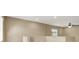 Cozy loft area with neutral walls, carpet flooring and ceiling fan at 7931 Mineral Peak St, Las Vegas, NV 89166