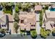 Expansive property with lush landscaping, a private pool, and a charming detached garage at 7947 Lookout Rock Cir, Las Vegas, NV 89129