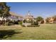 Charming community park gazebo surrounded by greenery, offering a serene outdoor space for relaxation at 7947 Lookout Rock Cir, Las Vegas, NV 89129