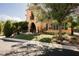 Stunning home featuring green lawn and a mature trees at 7947 Lookout Rock Cir, Las Vegas, NV 89129