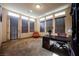 Bright office space with built-in shelves, a desk, and plenty of natural light at 7947 Lookout Rock Cir, Las Vegas, NV 89129
