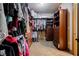 Organized walk-in closet with custom shelving and plenty of hanging space at 7947 Lookout Rock Cir, Las Vegas, NV 89129