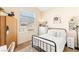 Cozy bedroom featuring natural light, neutral colors, and traditional furnishings at 812 Stannard Ct, Henderson, NV 89052