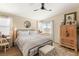 Cozy bedroom with a comfortable bed, neutral colors, ample natural light, and stylish furnishings at 812 Stannard Ct, Henderson, NV 89052