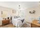 Comfortable bedroom featuring neutral tones, wood floors, and a well-appointed design at 812 Stannard Ct, Henderson, NV 89052