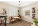 Cozy dining room with plantation shutters and charming decor, perfect for intimate meals at 812 Stannard Ct, Henderson, NV 89052