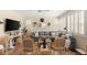 Stylish living room with wood floors, a gray sectional sofa, and a large window at 812 Stannard Ct, Henderson, NV 89052