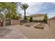 Backyard featuring raised garden beds, perfect for cultivating your own vegetables and flowers in a tranquil outdoor space at 8130 Cassian Ct, Las Vegas, NV 89129