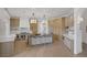 Modern kitchen featuring a large island, stainless steel appliances, custom cabinetry, and open floor plan at 8130 Cassian Ct, Las Vegas, NV 89129
