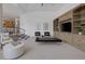 Bright living room featuring a built-in media center and elegant contemporary furnishings at 8130 Cassian Ct, Las Vegas, NV 89129