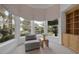 Bright sitting area with large windows offering a scenic view of the outdoor landscape at 8130 Cassian Ct, Las Vegas, NV 89129