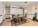 Dining room with wood table, seating for six, and tile flooring throughout at 821 Tollbrook Way, Henderson, NV 89011