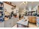 Functional kitchen with laminate cabinets, an island, and a breakfast bar at 821 Tollbrook Way, Henderson, NV 89011