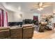 Comfortable living room featuring recliner seating and tile flooring throughout at 821 Tollbrook Way, Henderson, NV 89011