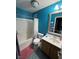 Bright bathroom featuring a tub-shower combo and vanity with storage at 8237 Cline Mountain St, Las Vegas, NV 89131