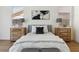 Bedroom with neutral tones, wood floors and natural light at 8714 Las Posas Ave, Las Vegas, NV 89147