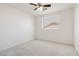 Clean, carpeted bedroom with a window and neutral decor offers a blank canvas at 8714 Las Posas Ave, Las Vegas, NV 89147
