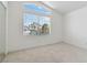 Empty bedroom with a large window, perfect for a new owner to decorate at 8714 Las Posas Ave, Las Vegas, NV 89147