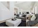 Open-concept living room, seamlessly connected to the modern kitchen space at 8714 Las Posas Ave, Las Vegas, NV 89147