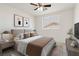Tastefully furnished bedroom featuring a plush bed, neutral tones, and stylish decor at 8714 Las Posas Ave, Las Vegas, NV 89147