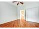 Bedroom showcases hardwood floors and access to a connecting room at 8725 Red Rio Dr # 203, Las Vegas, NV 89128