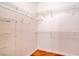 Walk-in closet with wire shelving and hardwood floor at 8725 Red Rio Dr # 203, Las Vegas, NV 89128