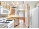 Updated kitchen showcases granite countertops and modern appliances, providing an efficient workspace at 8725 Red Rio Dr # 203, Las Vegas, NV 89128