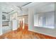 Spacious living room showcases hardwood floors and view into the kitchen at 8725 Red Rio Dr # 203, Las Vegas, NV 89128
