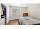 Bright bedroom featuring a cozy bed, closet and ample natural light at 8932 Antioch Way, Las Vegas, NV 89117