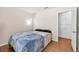 Neutral bedroom with a plush bed, closet, and recessed ceiling light at 8932 Antioch Way, Las Vegas, NV 89117