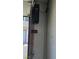 Installed garage door opener in a residential garage with a partially open garage door at 8932 Antioch Way, Las Vegas, NV 89117