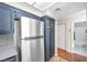 The kitchen includes updated stainless steel appliances and plenty of cabinet storage at 8932 Antioch Way, Las Vegas, NV 89117