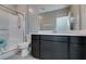 Bathroom featuring a glass-enclosed shower and sleek vanity at 9239 Albus Hills Ave, Las Vegas, NV 89143