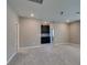 Spacious bonus room with neutral carpet, recessed lighting and a built in storage unit at 9239 Albus Hills Ave, Las Vegas, NV 89143