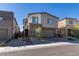 Charming two-story home with brick paver driveway, stone accents, and a two-car garage at 9239 Albus Hills Ave, Las Vegas, NV 89143