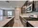 Modern kitchen with stainless steel appliances, a large island, and plenty of counter space at 9239 Albus Hills Ave, Las Vegas, NV 89143