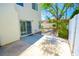 Private backyard featuring a patio and garden area, surrounded by mature landscaping at 9408 Amber Valley Ln, Las Vegas, NV 89134