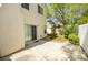 Private backyard with concrete patio and some green landscaping at 9408 Amber Valley Ln, Las Vegas, NV 89134