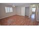 Bedroom featuring hardwood floors, natural light, and closet at 9408 Amber Valley Ln, Las Vegas, NV 89134