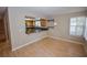 Dining area featuring hardwood floors, breakfast bar and natural light at 9408 Amber Valley Ln, Las Vegas, NV 89134