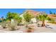 Attractive single Gathering home with desert landscaping and a red tile roof at 9408 Amber Valley Ln, Las Vegas, NV 89134