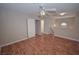 Loft features laminate floors, neutral paint, and a closet with sliding doors at 9408 Amber Valley Ln, Las Vegas, NV 89134