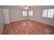 Spacious main bedroom with hardwood floors and plenty of natural light at 9408 Amber Valley Ln, Las Vegas, NV 89134
