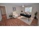 Staged office features hardwood floors, window with shutters, and modern décor at 9408 Amber Valley Ln, Las Vegas, NV 89134