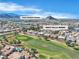Wonderful aerial view of community with Palm Valley Golf Course, and mountain views at 9513 Villa Ridge Dr, Las Vegas, NV 89134