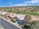 Aerial view of the home showing the meticulously maintained landscaping and the golf course at 9513 Villa Ridge Dr, Las Vegas, NV 89134