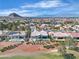 High aerial view of homes backing to the golf course in a well-maintained community at 9513 Villa Ridge Dr, Las Vegas, NV 89134