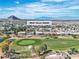 An aerial view showcases the property's location on a golf course in a beautiful community at 9513 Villa Ridge Dr, Las Vegas, NV 89134